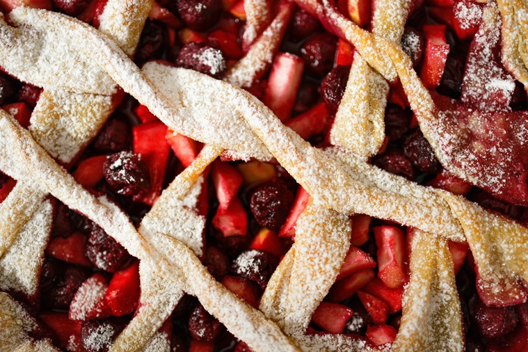 Extreme close up of a baked apple cranberry pie