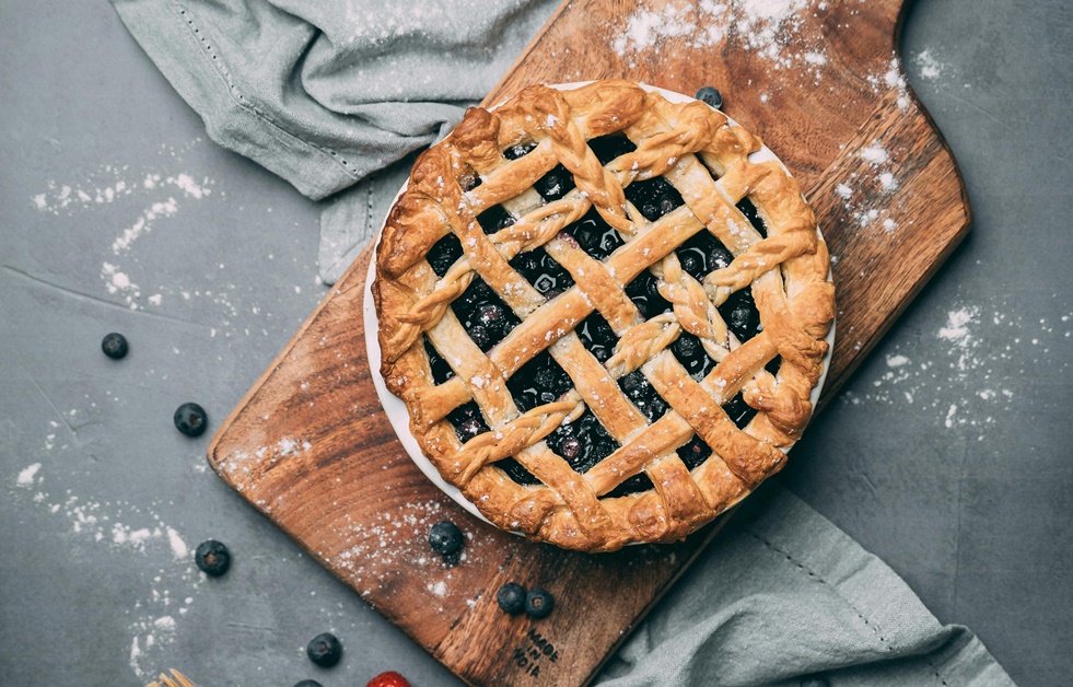 Berry Pie On Top Of Wooden Chopping Board